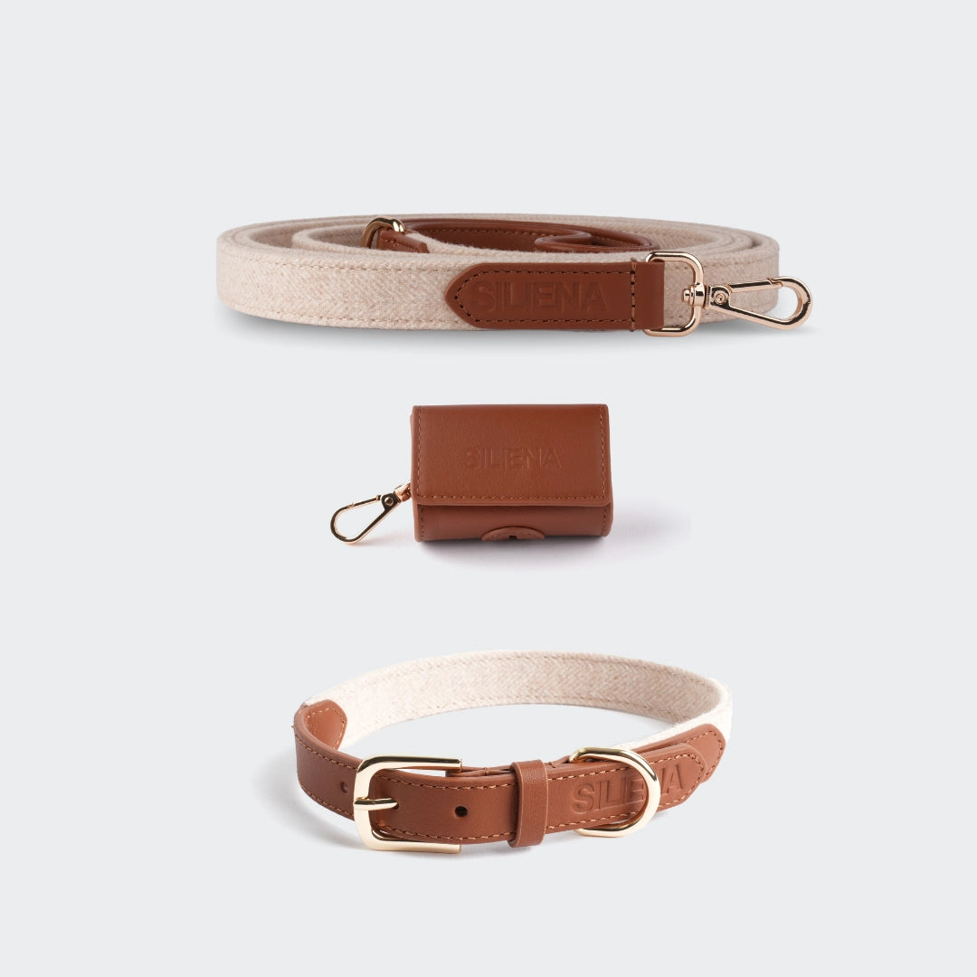 Hundeset bestehend aus Leine, Halsband und Kotbeutelspender, in hellbrauner Lederoptik mit goldener Hardware und geprägtem „SILENA“ Logo